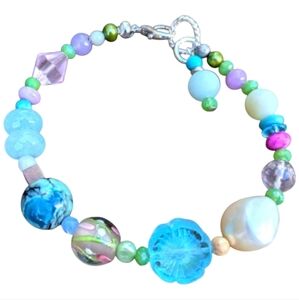 Turquoise Blue Beaded Bracelet with Textured and Pearlescent Accents